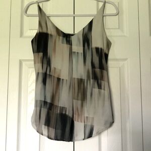 Top with adjustable strap and front pleat